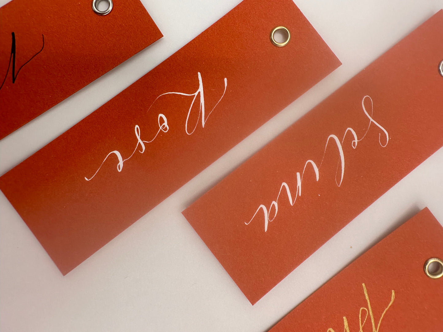 OCHRE Calligraphy Place Name Card | Matte Coloured Card with Hand Written Calligraphy optional gold or silver eyelet