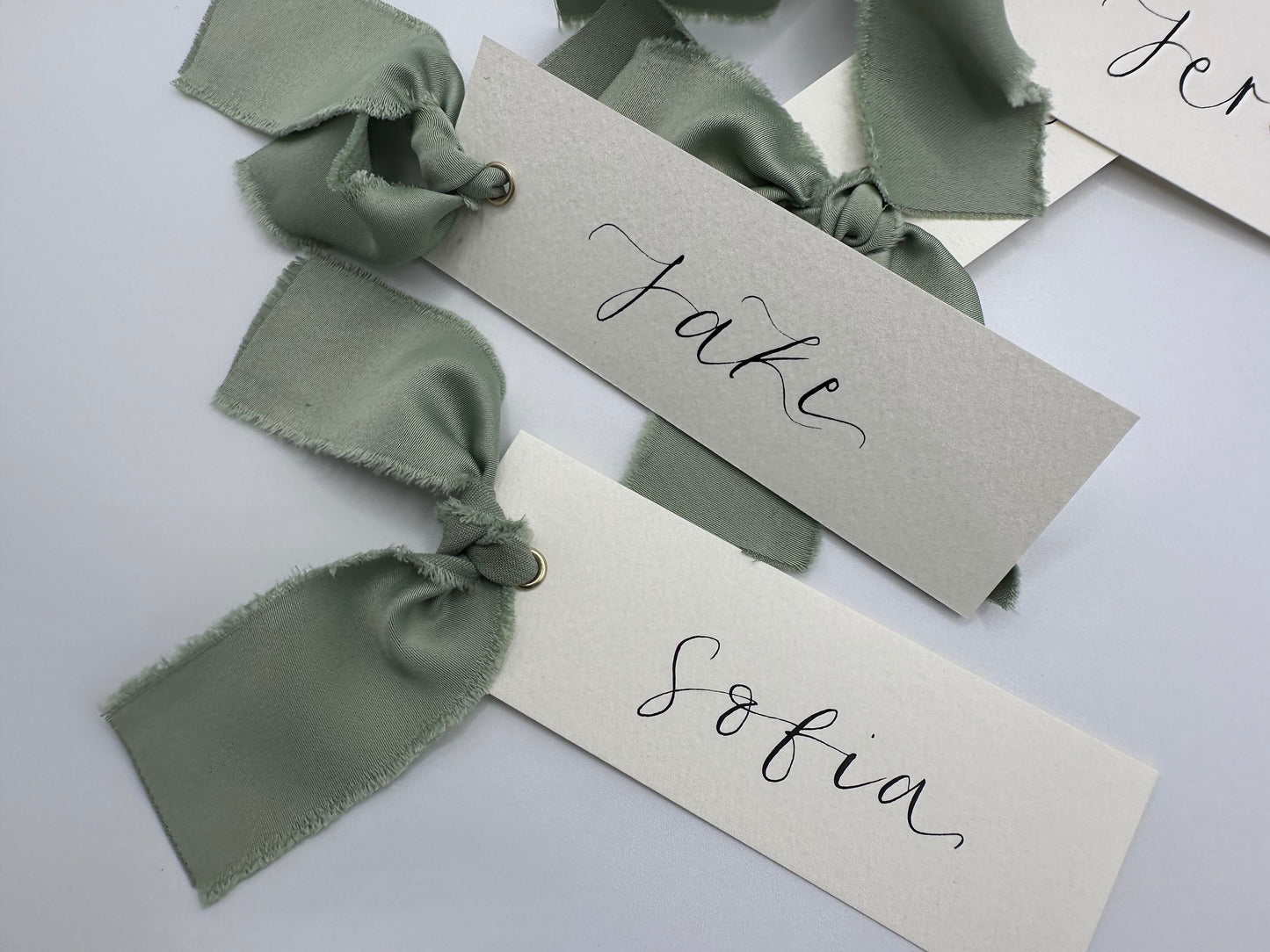 ivory wedding place card, elegant place cards, customizable wedding place cards, luxurious place card, ivory and gold wedding decor, elegant wedding stationery, personalized wedding reception, chic table decorations, classic wedding place setting, sophisticated wedding details