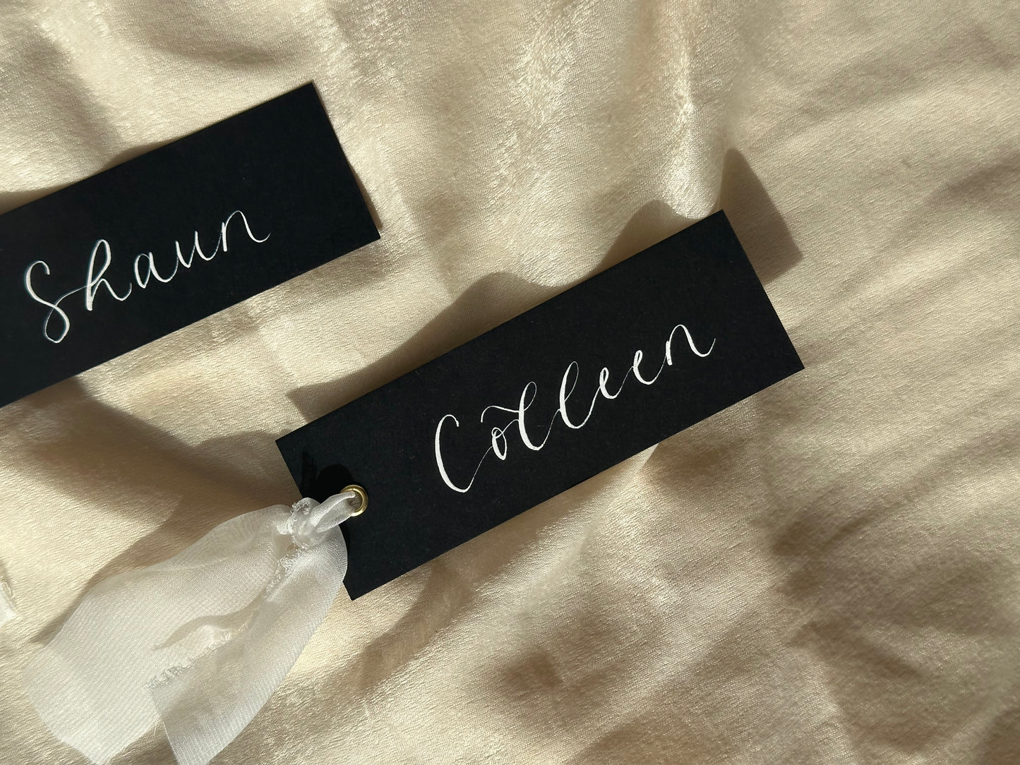 BLACK + WHITE Organza Ribbon Calligraphy Place Name Card | Black Calligraphy Wedding Place Name Card | Gold or Silver Eyelet