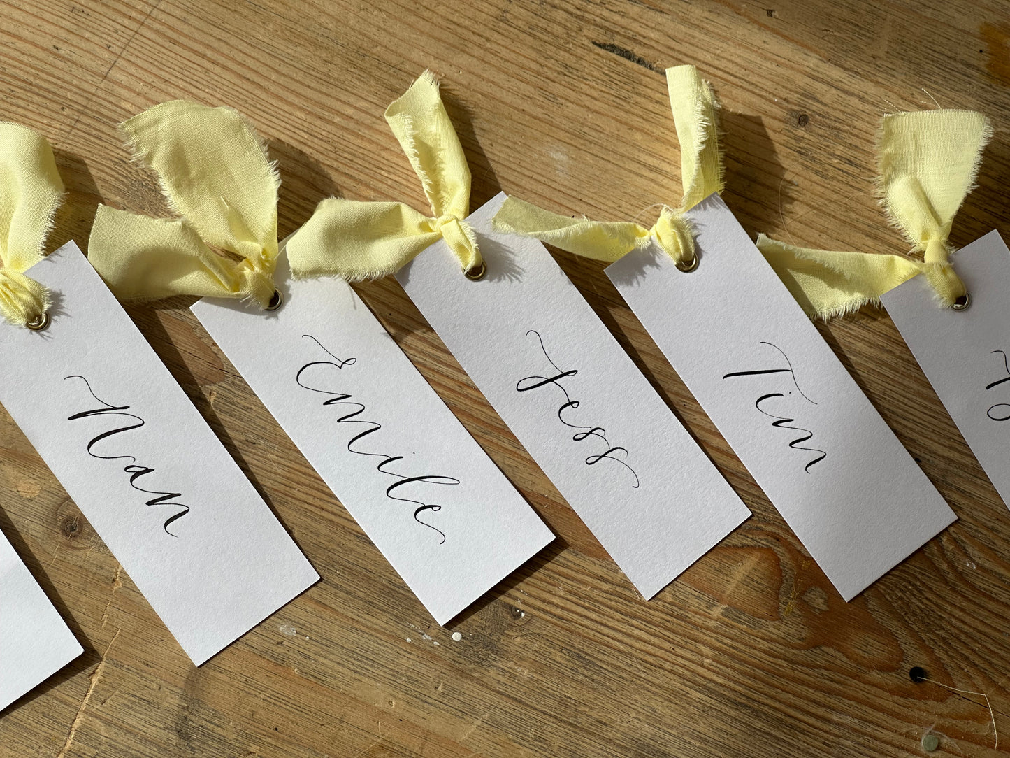 BUTTER Ribbon Calligraphy Place Name Card | White Calligraphy Wedding Place Name Card | Gold or Silver Eyelet