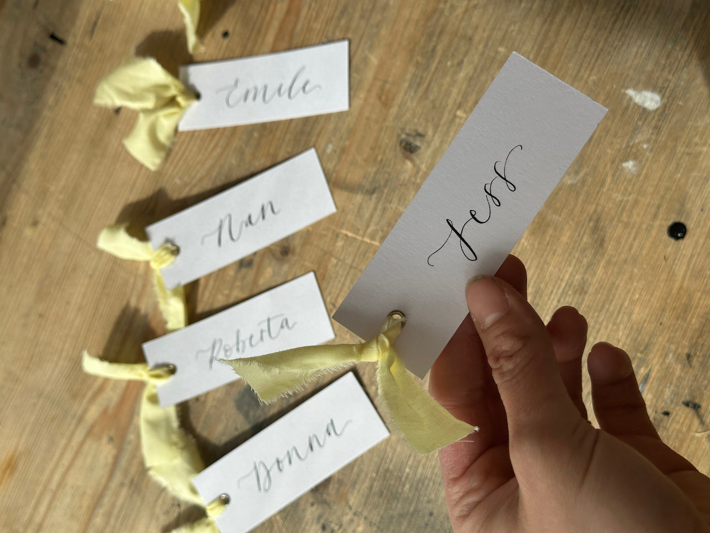 BUTTER Linen Calligraphy Place Name Card | White Calligraphy Wedding Place Name Card | Gold or Silver Eyelet