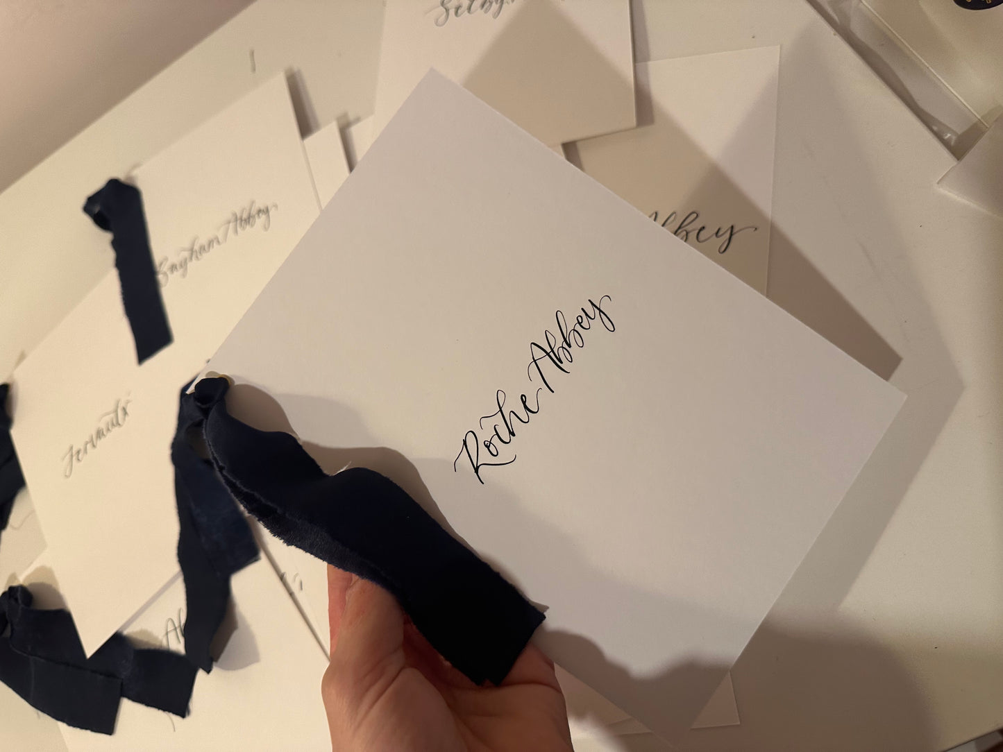 NAVY Chiffon Ribbon Calligraphy Table Number / Table Name Card | A5 A6 Calligraphy Wedding Table Number / Table Name Card | Gold or Silver Eyelet