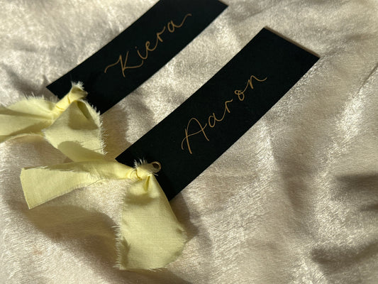 BLACK + BUTTER Linen Ribbon Calligraphy Place Name Card | Black Calligraphy Wedding Place Name Card | Gold or Silver Eyelet