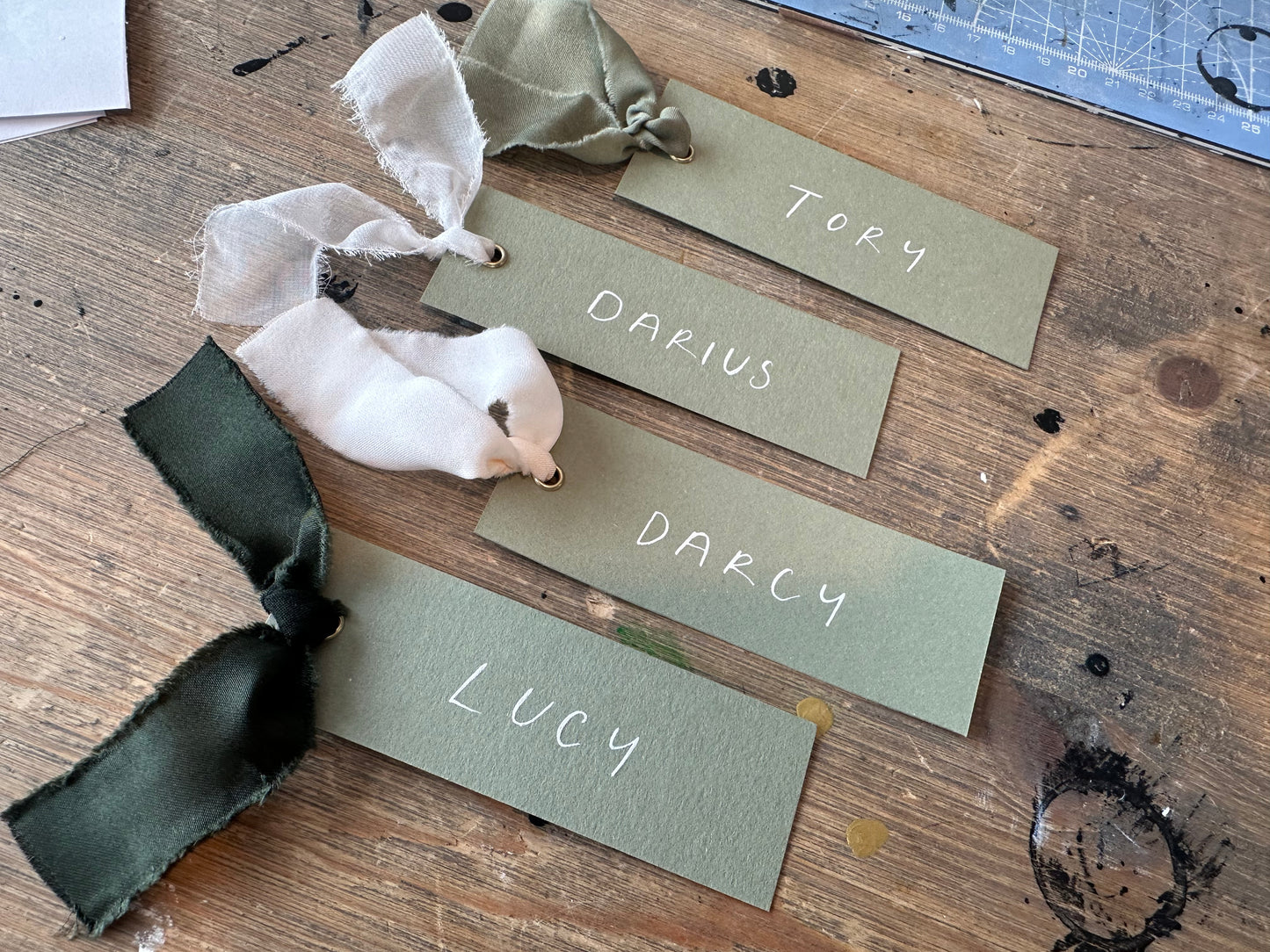 EUCALYPTUS Minimal Handwritten Ribbon Place Name Card | Block Capital Wedding Place Name Card | Gold or Silver Eyelet