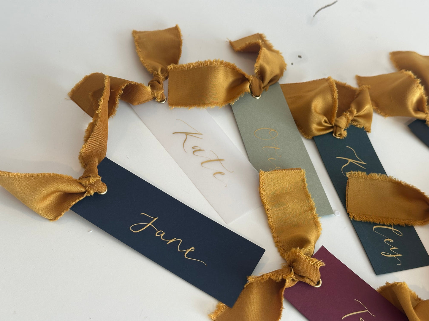 Pack of 5 Personalised Gold Calligraphy Ribbon Place Cards | Christmas & New Year Table Name Cards