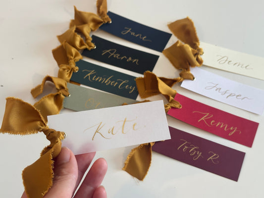 Pack of 5 Personalised Gold Calligraphy Ribbon Place Cards | Christmas & New Year Table Name Cards