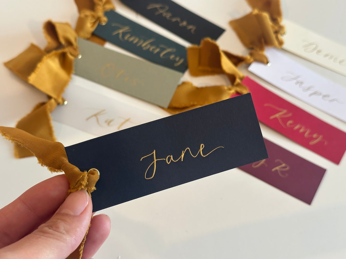 Pack of 5 Personalised Gold Calligraphy Ribbon Place Cards | Christmas & New Year Table Name Cards