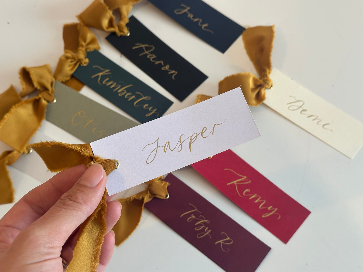 Pack of 5 Personalised Gold Calligraphy Ribbon Place Cards | Christmas & New Year Table Name Cards