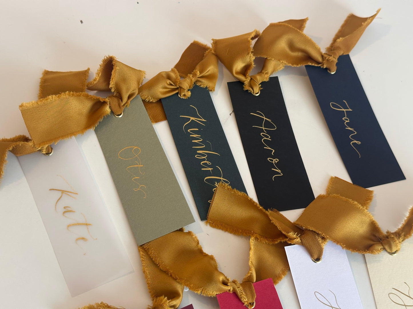 Pack of 5 Personalised Gold Calligraphy Ribbon Place Cards | Christmas & New Year Table Name Cards