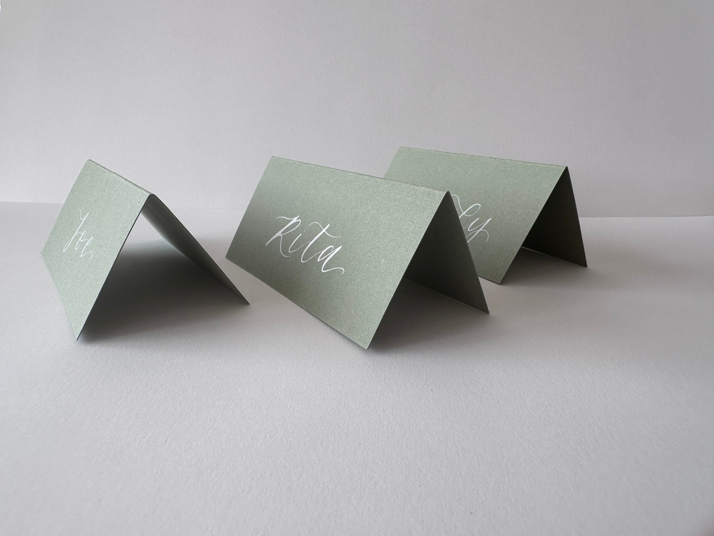 green colour place card, eco-friendly place cards, sustainable place card, green-themed seating cards, natural place card, green hue name tags, earthy place cards, environmentally friendly place cards, green shade escort cards, green-toned table cards