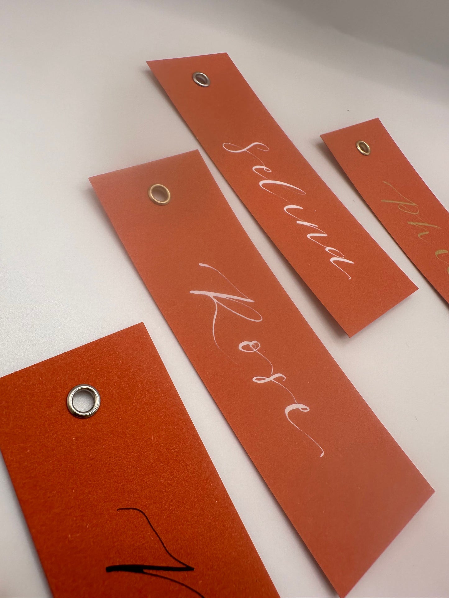 OCHRE Calligraphy Place Name Card | Matte Coloured Card with Hand Written Calligraphy optional gold or silver eyelet