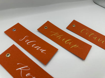 OCHRE Calligraphy Place Name Card | Matte Coloured Card with Hand Written Calligraphy optional gold or silver eyelet