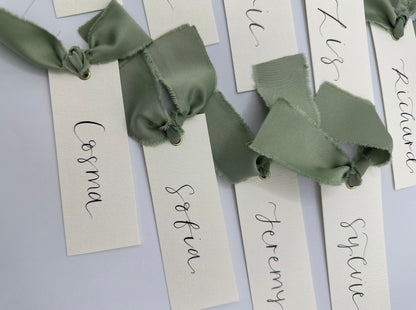 ivory wedding place card, elegant place cards, customizable wedding place cards, luxurious place card, ivory and gold wedding decor, elegant wedding stationery, personalized wedding reception, chic table decorations, classic wedding place setting, sophisticated wedding details