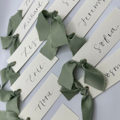 ivory wedding place card, elegant place cards, customizable wedding place cards, luxurious place card, ivory and gold wedding decor, elegant wedding stationery, personalized wedding reception, chic table decorations, classic wedding place setting, sophisticated wedding details
