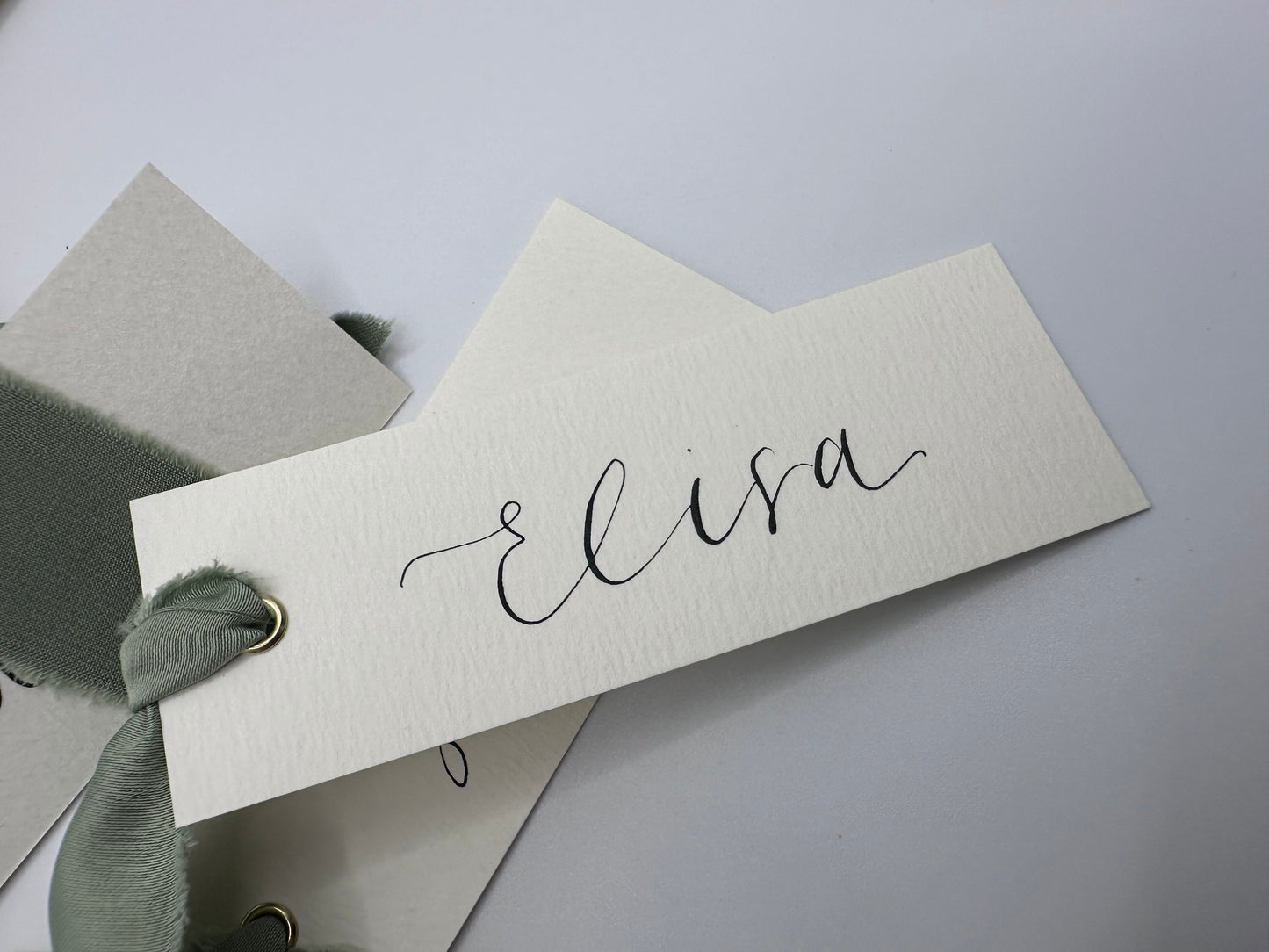Ivory Place Card Sage Green Satin | Calligraphy Wedding Place Name Card | Gold or Silver Eyelet