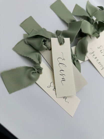ivory wedding place card, elegant place cards, customizable wedding place cards, luxurious place card, ivory and gold wedding decor, elegant wedding stationery, personalized wedding reception, chic table decorations, classic wedding place setting, sophisticated wedding details