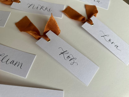 OCHRE Chiffon Ribbon Calligraphy Place Name Card | White Calligraphy Wedding Place Name Card | Gold or Silver Eyelet