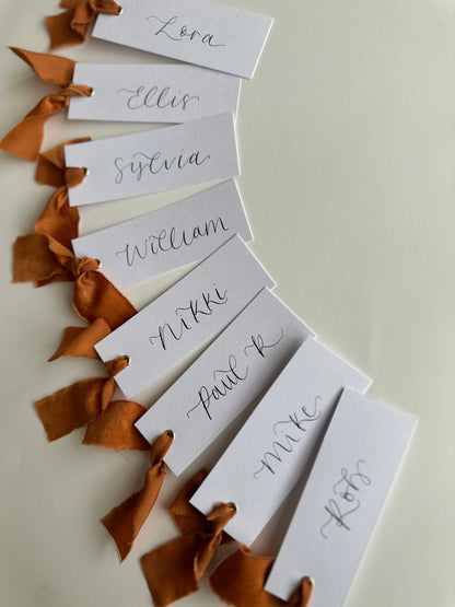 OCHRE Chiffon Ribbon Calligraphy Place Name Card | White Calligraphy Wedding Place Name Card | Gold or Silver Eyelet