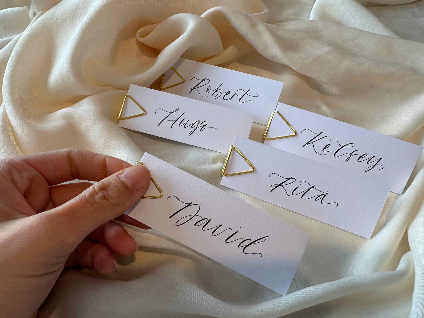 WHITE Calligraphy Place Name Card | White Calligraphy Wedding Place Name Card | Gold or Silver Eyelet