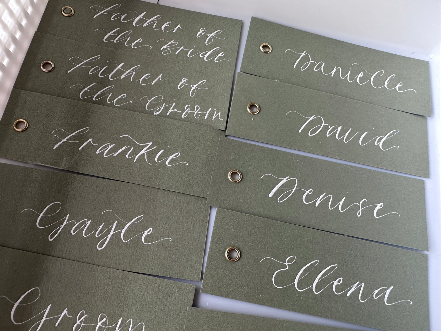 EUCALYPTUS Calligraphy Place Name Card | Matte Coloured Card with Hand Written Calligraphy optional gold or silver eyelet