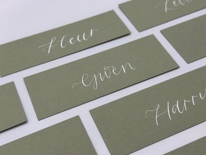 Calligraphy Wedding Place Name Card | Matte Coloured Card with Hand Written Calligraphy optional gold or silver eyelet