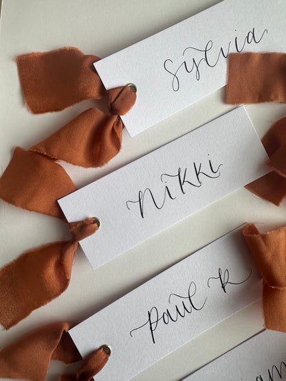 OCHRE Chiffon Ribbon Calligraphy Place Name Card | White Calligraphy Wedding Place Name Card | Gold or Silver Eyelet