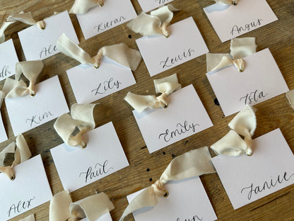 CHAMPAGNE White Square *ish Chiffon Ribbon Calligraphy Place Name Card | White Calligraphy Wedding Place Name Card | Gold or Silver Eyelet