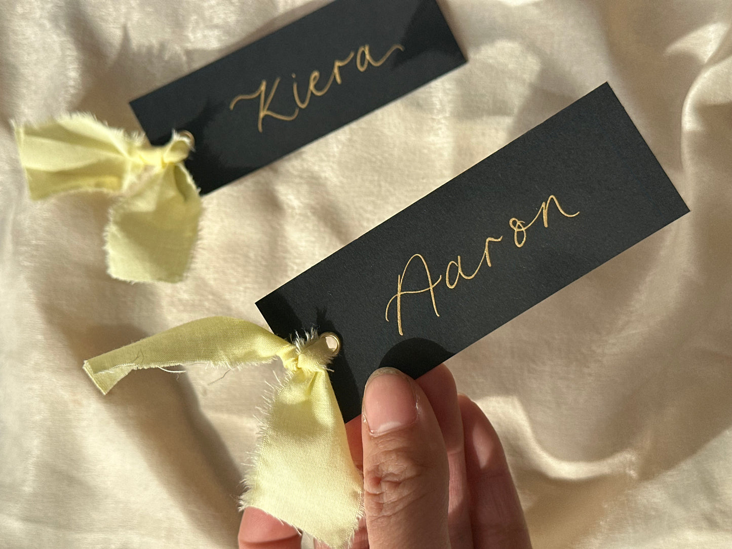 BLACK + BUTTER Linen Ribbon Calligraphy Place Name Card | Black Calligraphy Wedding Place Name Card | Gold or Silver Eyelet