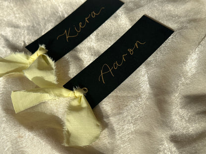 BLACK + BUTTER Linen Ribbon Calligraphy Place Name Card | Black Calligraphy Wedding Place Name Card | Gold or Silver Eyelet