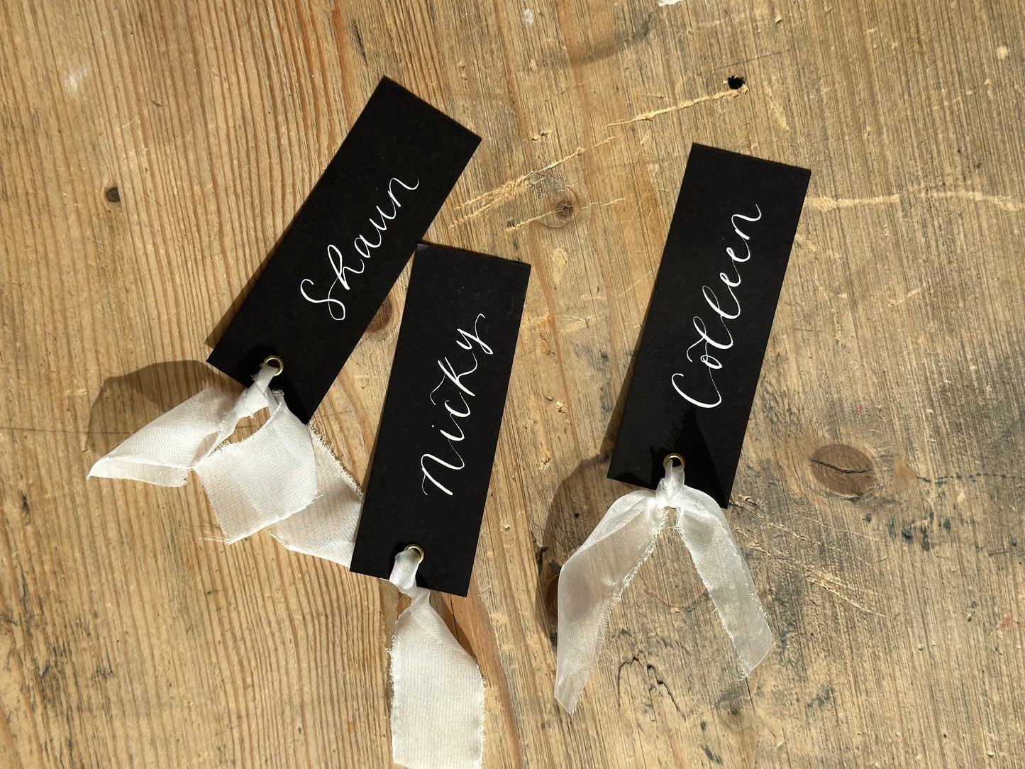 BLACK Ribbon Calligraphy Place Name Card | White Calligraphy Wedding Place Name Card | Gold or Silver Eyelet Place Card