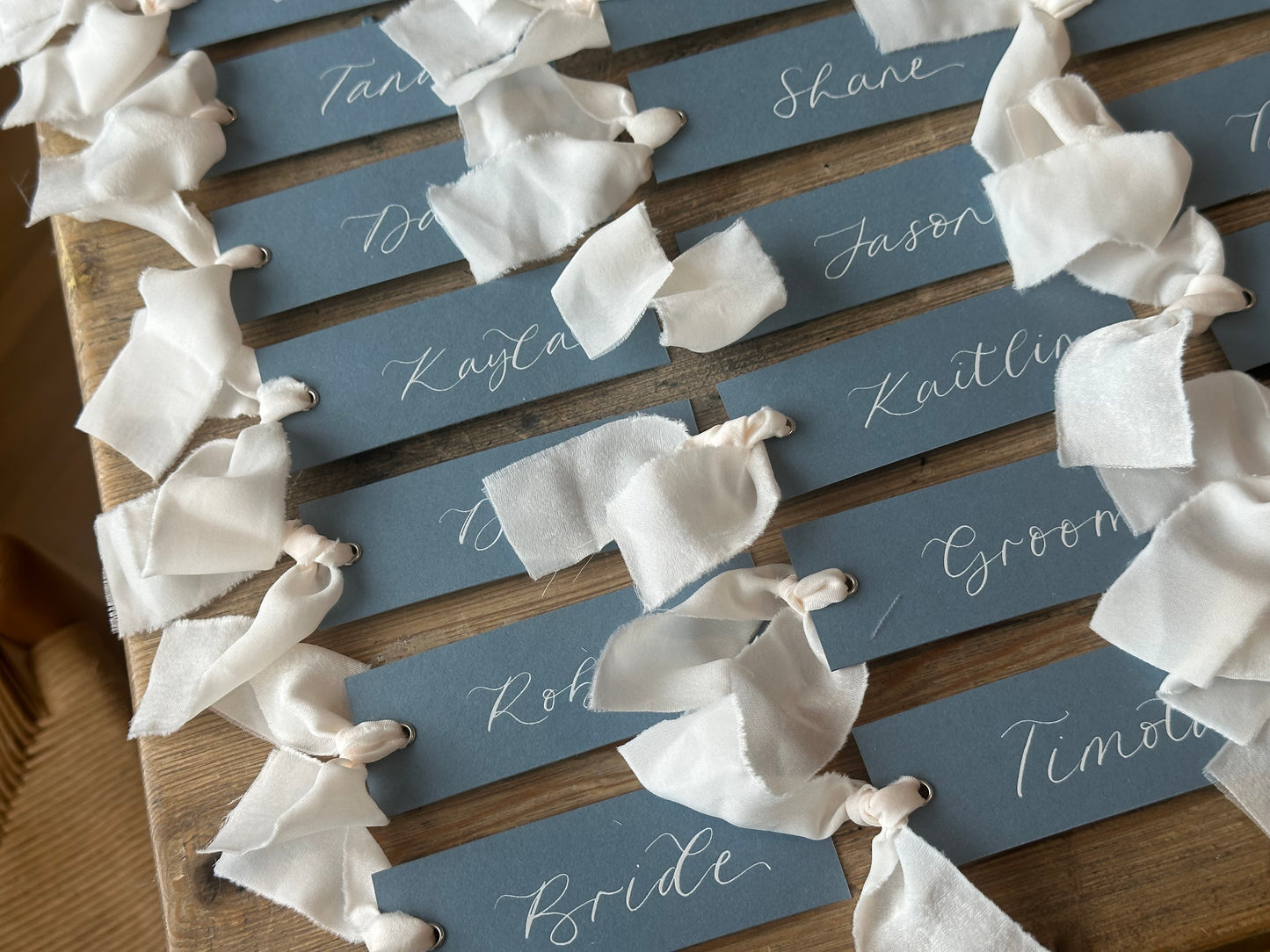 Dusky Blue Champagne Chiffon Wedding Place Cards with Ribbon | Calligraphy Place Cards