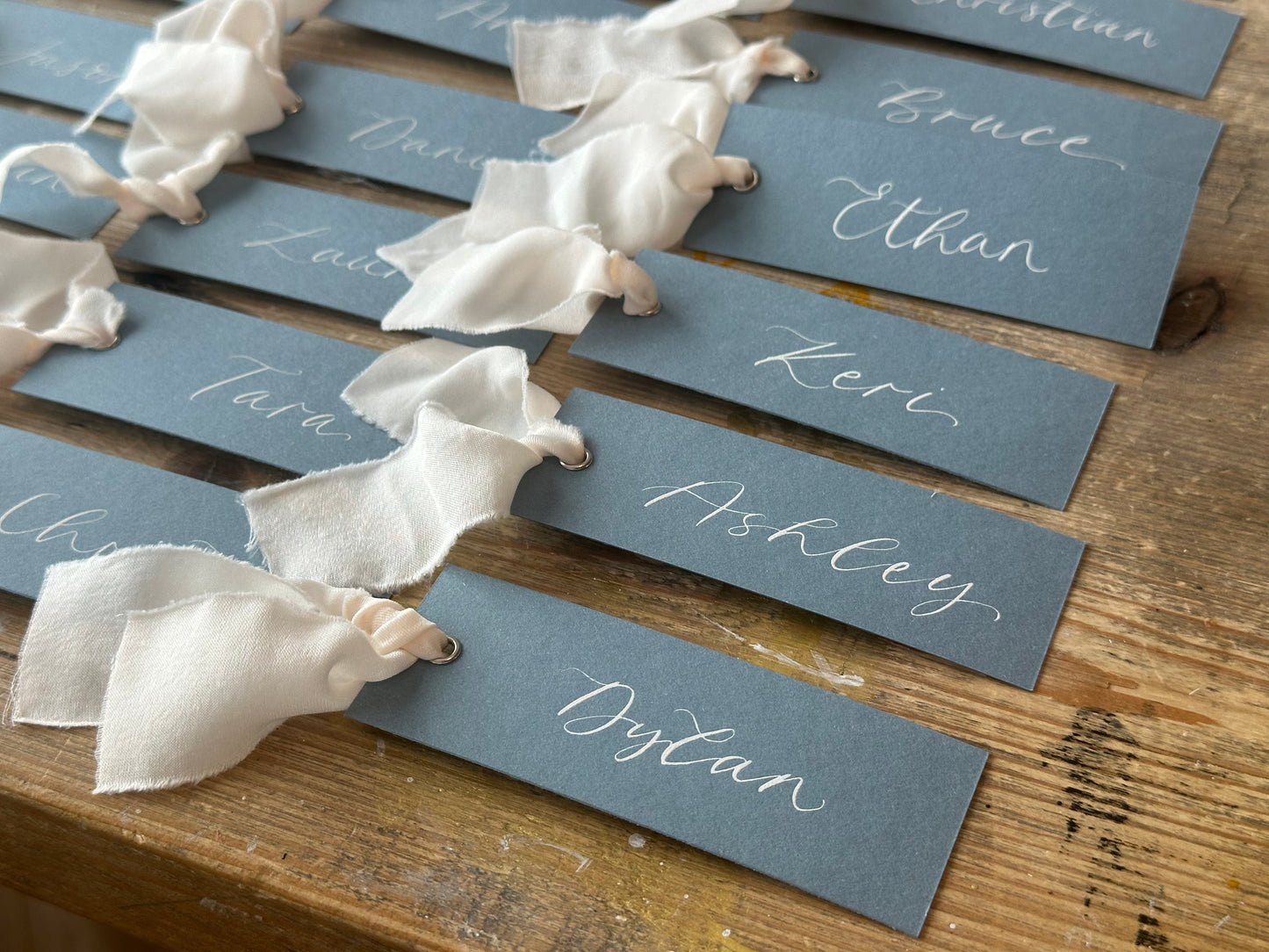 Dusky Blue Champagne Chiffon Wedding Place Cards with Ribbon | Calligraphy Place Cards