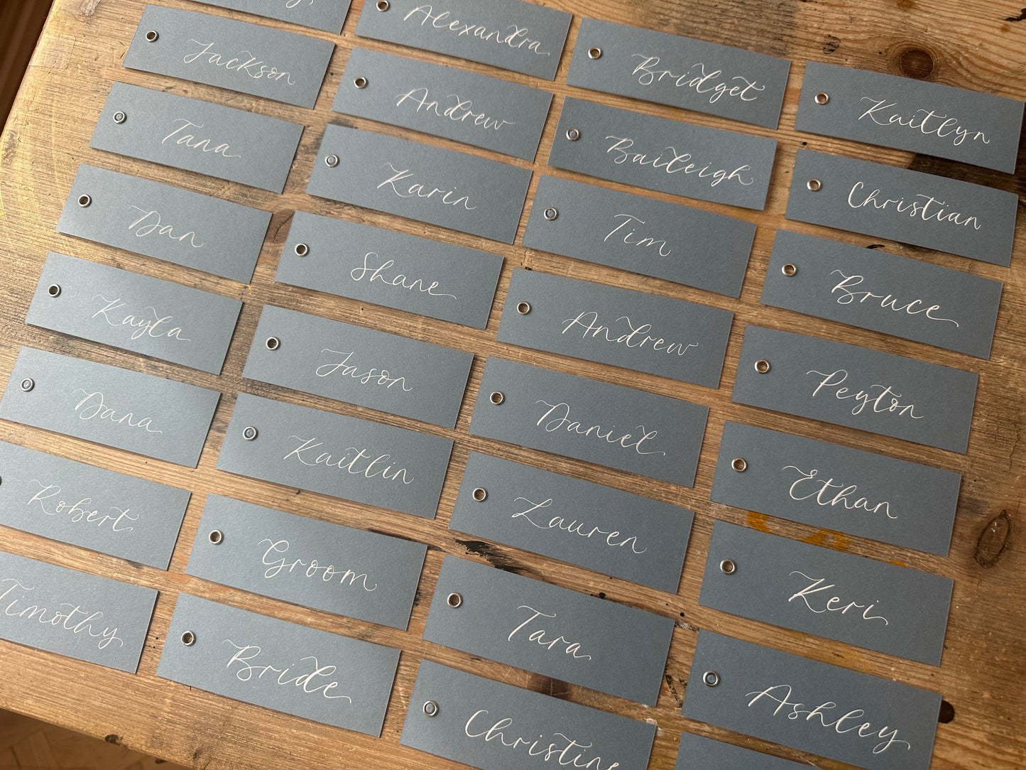 Dusky Blue Calligraphy Place Cards with Eyelet | DIY Add Your Own Ribbon Place Card