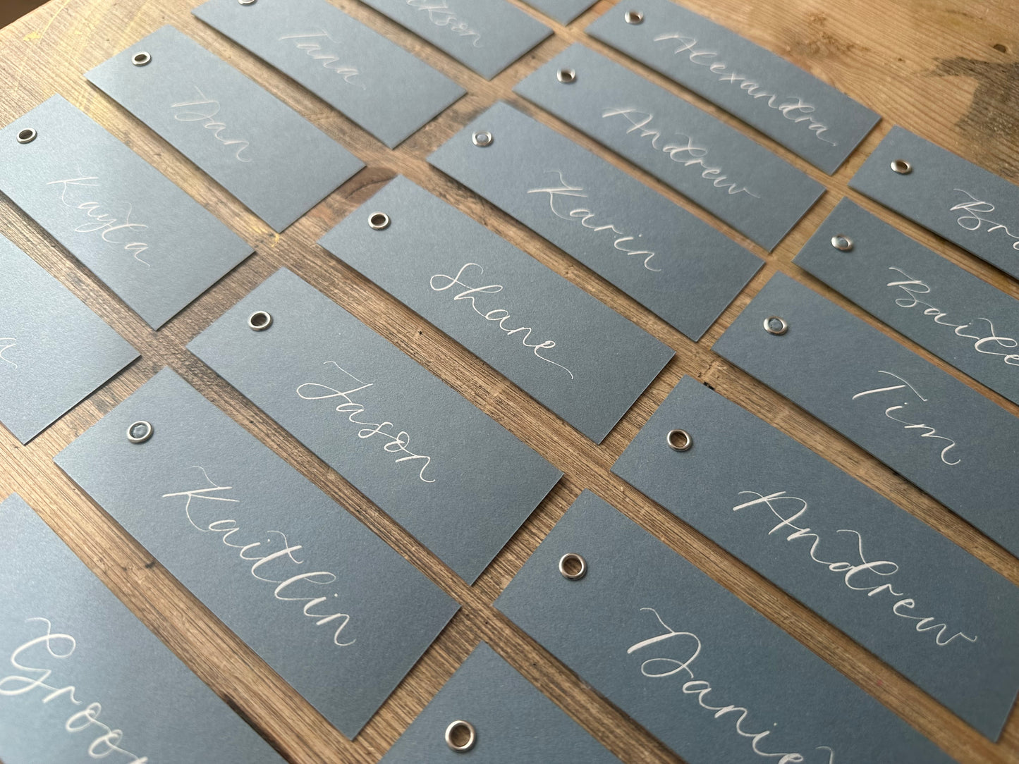 Dusky Blue Calligraphy Place Cards with Eyelet | DIY Add Your Own Ribbon Place Card