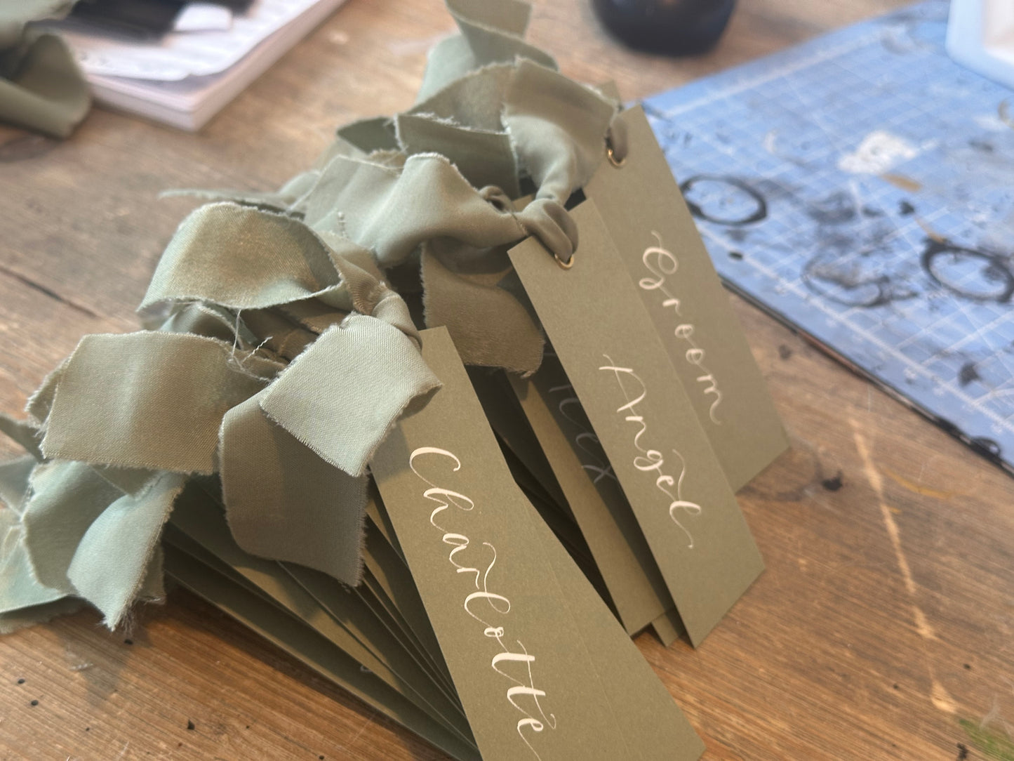 Eucalyptus Chiffon Wedding Place Cards with Ribbon | Green Calligraphy Place Cards