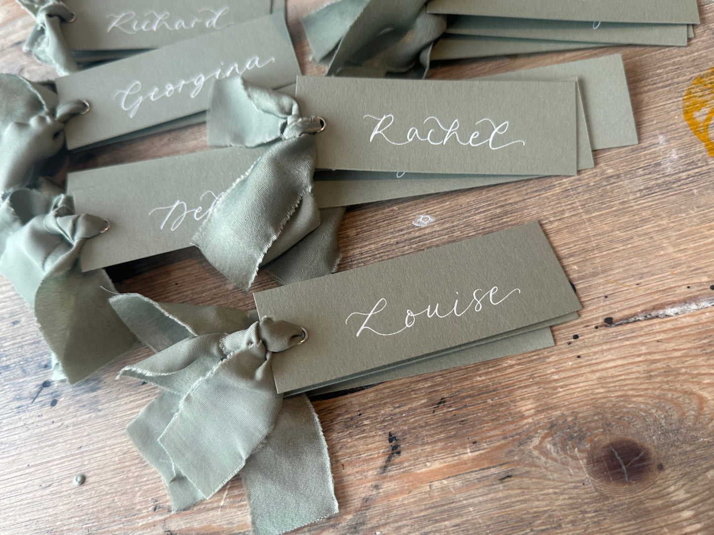 Eucalyptus Chiffon Wedding Place Cards with Ribbon | Green Calligraphy Place Cards