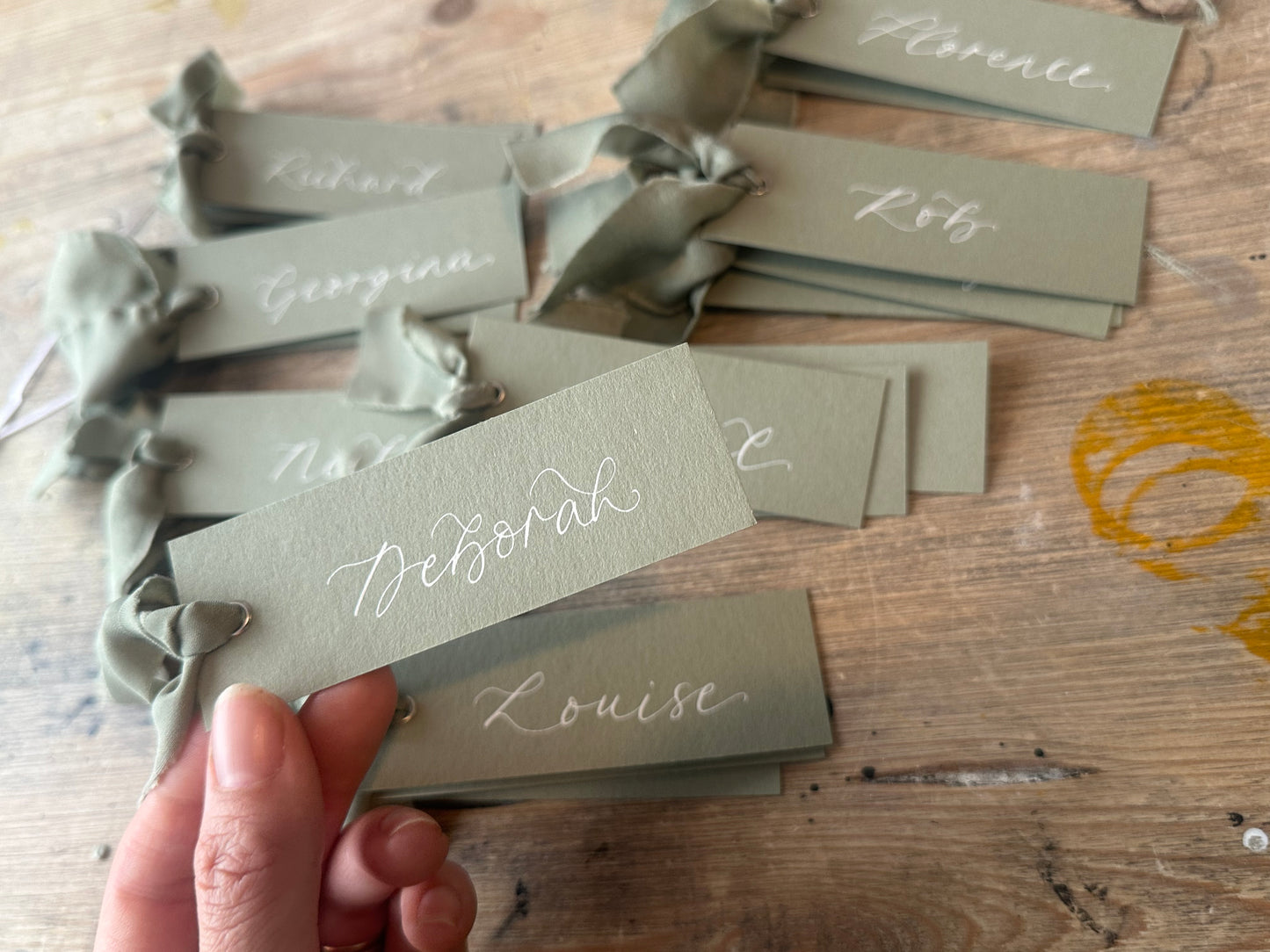 Eucalyptus Chiffon Wedding Place Cards with Ribbon | Green Calligraphy Place Cards