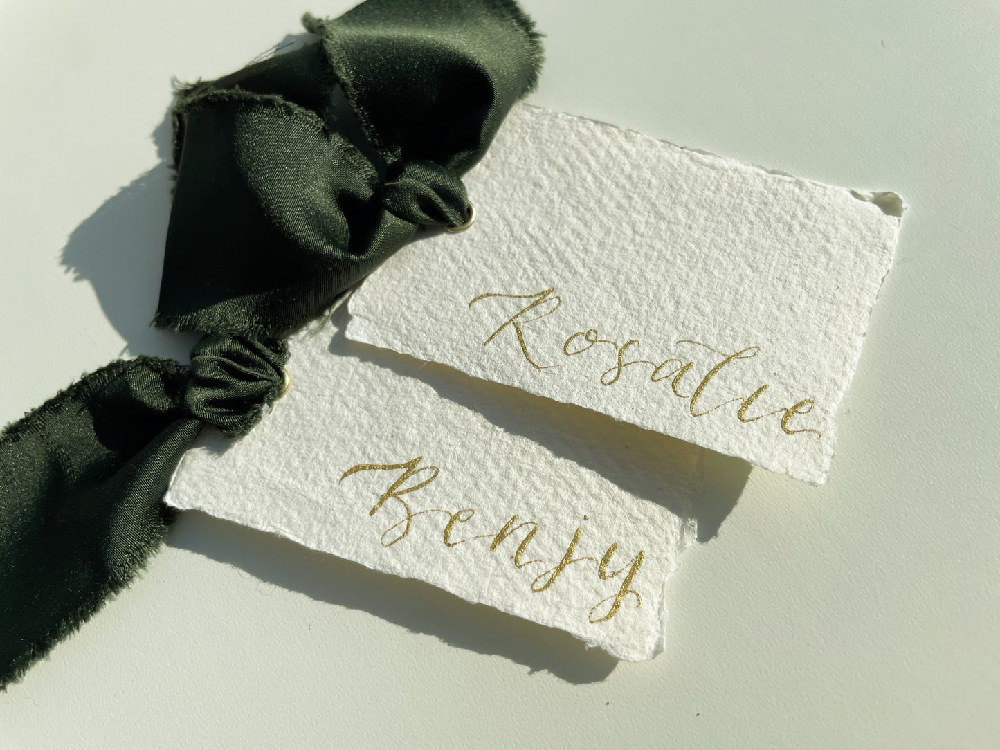 HANDMADE PAPER Ribbon Calligraphy Place Name Card | White Calligraphy Wedding Place Name Card | Gold or Silver Eyelet Place Card
