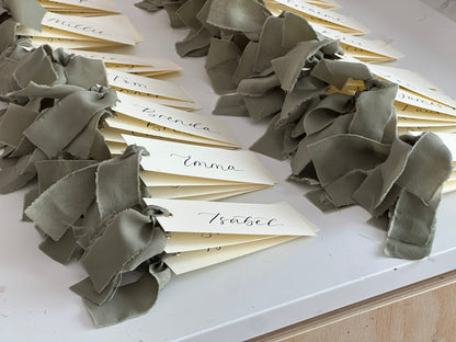 IVORY + EUCALYPTUS Green Chiffon Ribbon Calligraphy Place Name Card | Calligraphy Wedding Place Name Card | Gold or Silver Eyelet