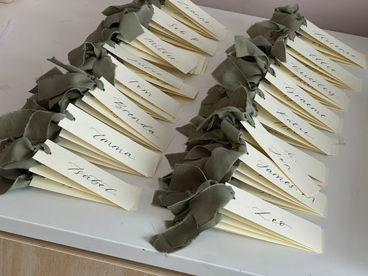 IVORY + EUCALYPTUS Green Chiffon Ribbon Calligraphy Place Name Card | Calligraphy Wedding Place Name Card | Gold or Silver Eyelet