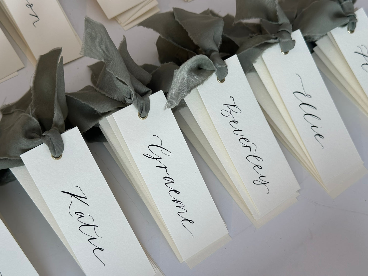 IVORY + EUCALYPTUS Green Chiffon Ribbon Calligraphy Place Name Card | Calligraphy Wedding Place Name Card | Gold or Silver Eyelet