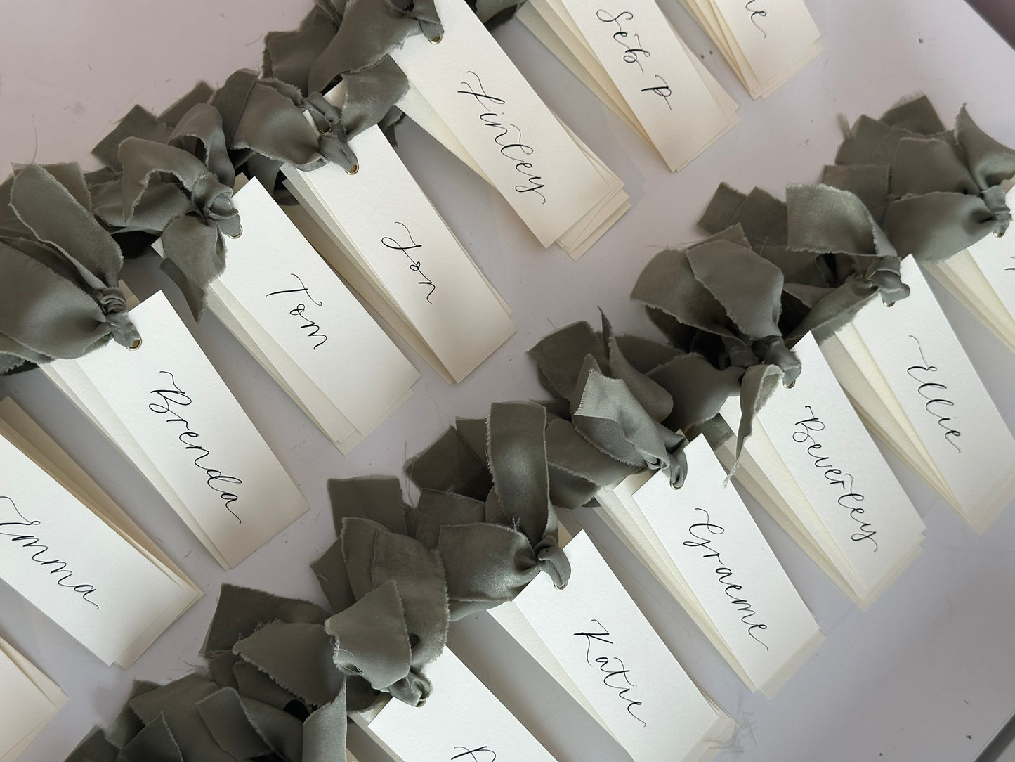 IVORY + EUCALYPTUS Green Chiffon Ribbon Calligraphy Place Name Card | Calligraphy Wedding Place Name Card | Gold or Silver Eyelet