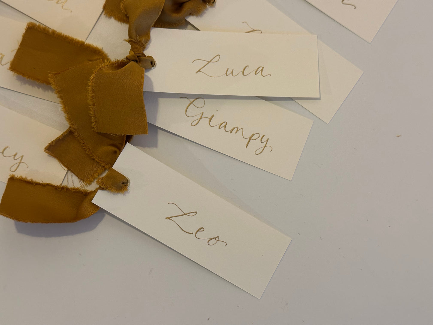 Ivory Gold Satin Wedding Place Cards with Ribbon | Calligraphy Place Cards
