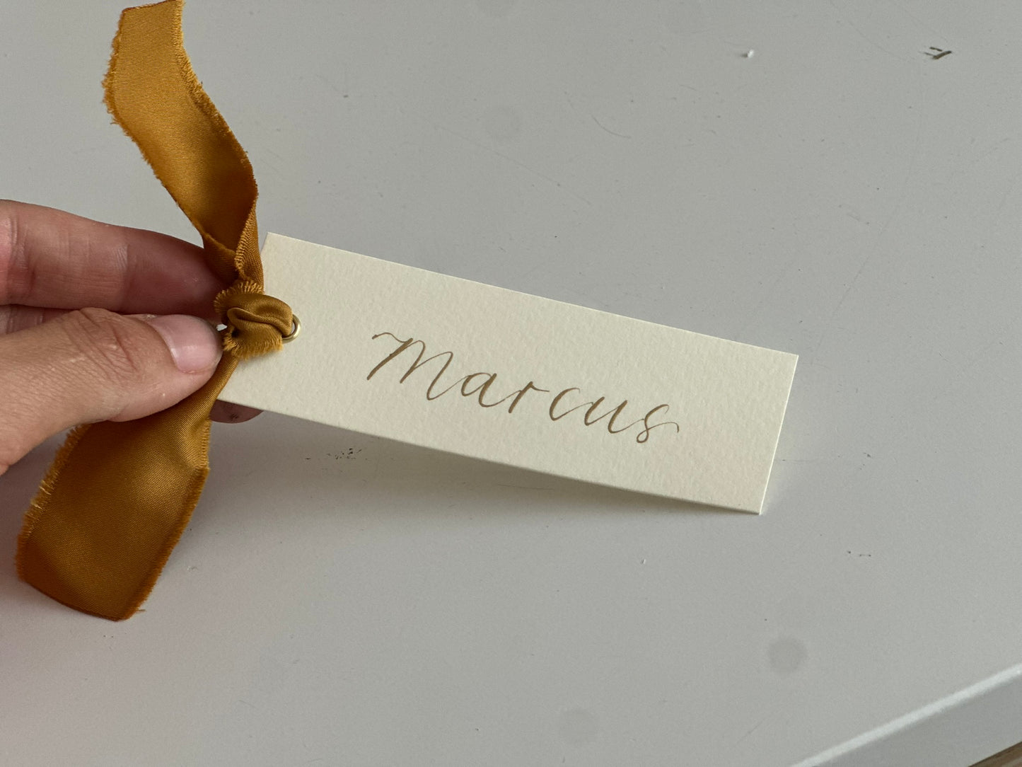 IVORY + GOLD Satin Ribbon Calligraphy Place Name Card | Calligraphy Wedding Place Name Card | Gold or Silver Eyelet
