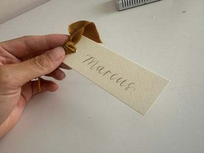 IVORY + GOLD Satin Ribbon Calligraphy Place Name Card | Calligraphy Wedding Place Name Card | Gold or Silver Eyelet