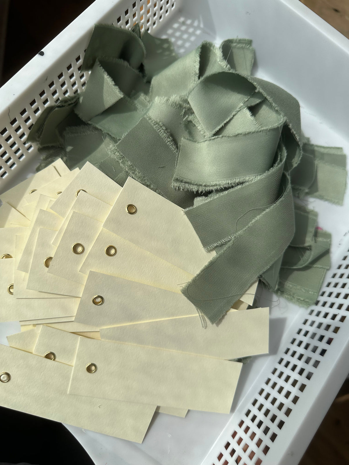 Blank place cards with sage satin ribbon and eyelet