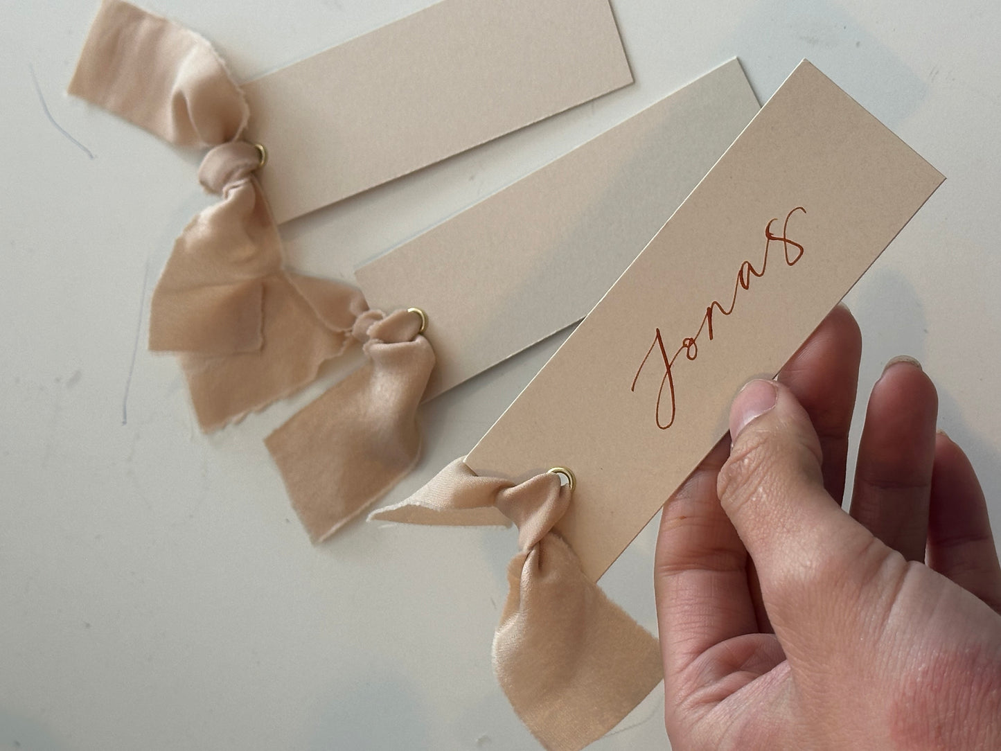 Nude Chiffon Wedding Place Cards with Ribbon | Beige Calligraphy Place Cards