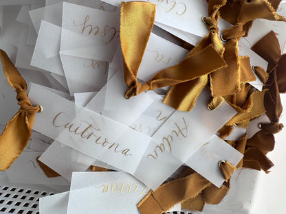 VELLUM Opaque Ribbon Calligraphy Place Name Card | White Calligraphy Wedding Place Name Card | Gold or Silver Eyelet Place Card