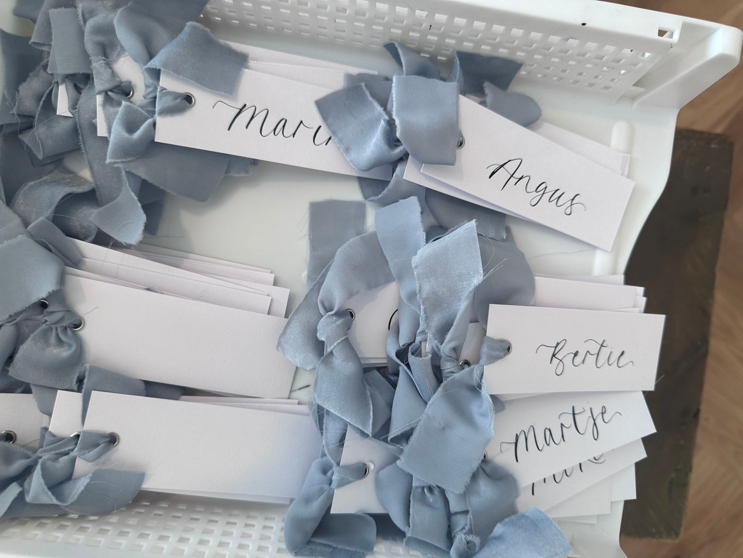 DUSKY BLUE Chiffon Ribbon Calligraphy Place Name Card | White Calligraphy Wedding Place Name Card | Gold or Silver Eyelet