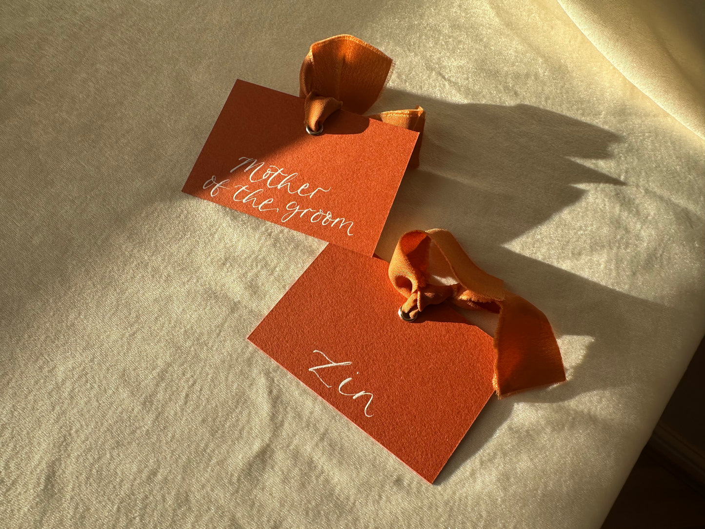 OCHRE Square *ish Ribbon Place Card | Calligraphy Wedding Place Name Card | Gold or Silver Eyelet